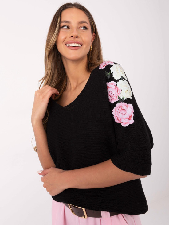 Maglione nero con motivo floreale e maniche 3/4