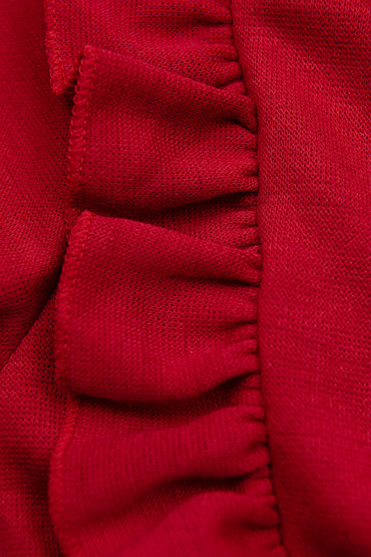 Abito rosso con gonna plissettata in ecopelle