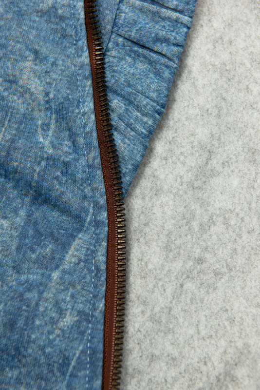 Felpa blu chiaro con cerniera asimmetrica