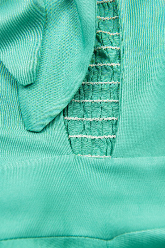 Tuta verde turchese