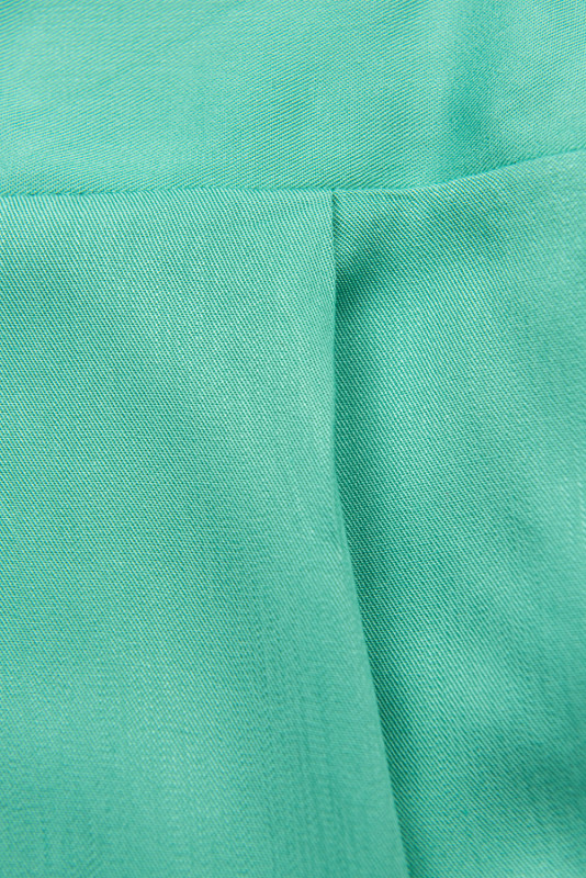 Tuta verde turchese