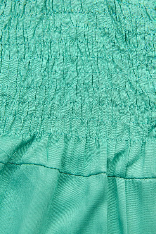 Tuta verde turchese