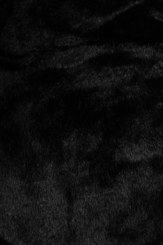 Giacca nera con marsupio