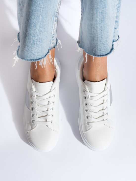 Sneakers bianche con striscia argentata