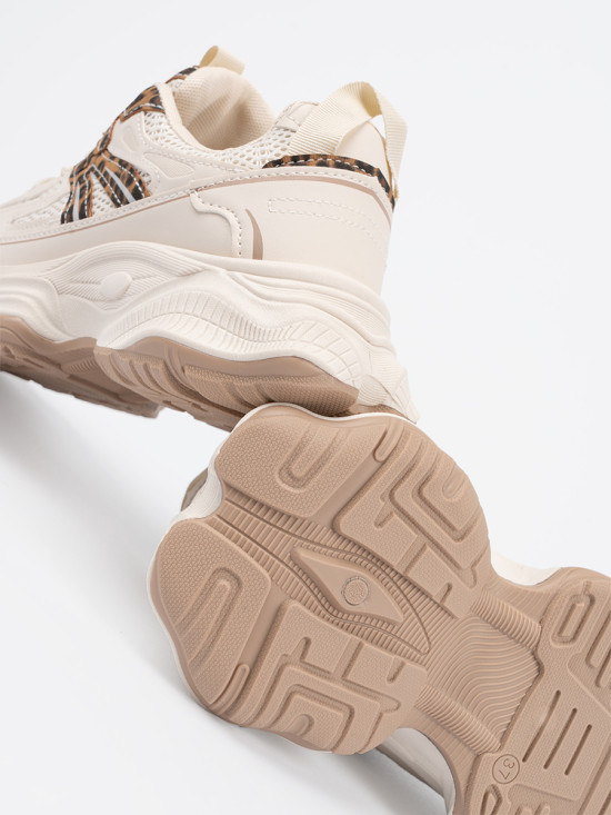 Sneakers con suola spessa in stampa leopardata