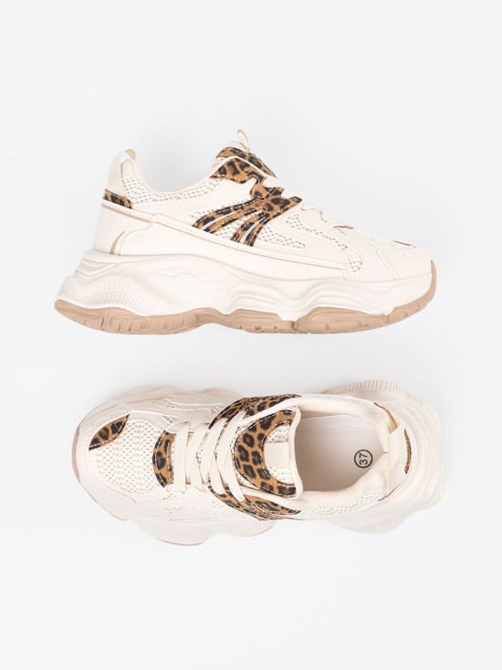 Sneakers con suola spessa in stampa leopardata