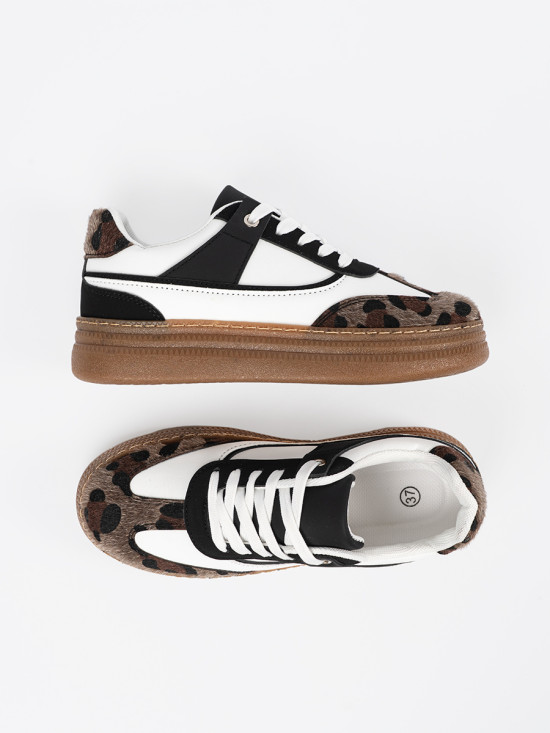 Sneakers bianco-neri con dettagli leopardati