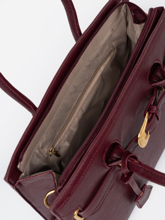 Borsa bordeaux con fibbia decorativa dorata