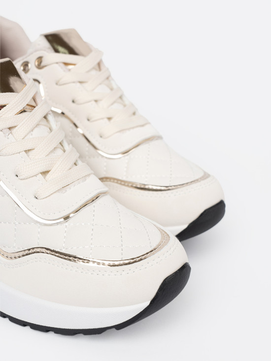 Sneakers beige con accenti dorati scintillanti