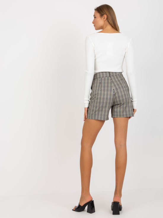 Pantaloni corti eleganti beige e bianchi con legatura
