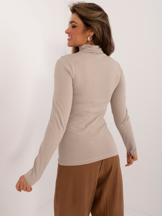 Blusa beige elegante con maniche lunghe