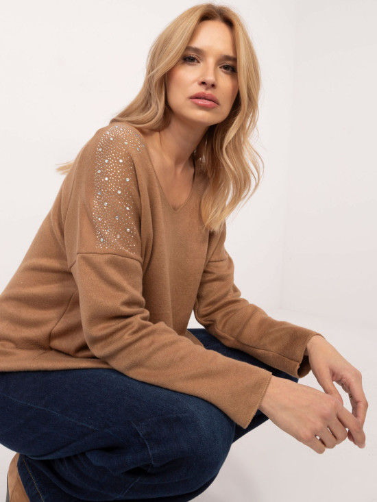 Maglione elegante con applicazione