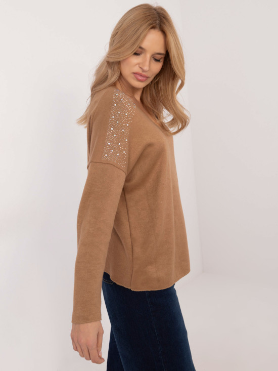 Maglione elegante con applicazione
