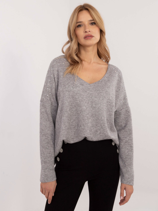 Pullover grigio elegante con applicazione