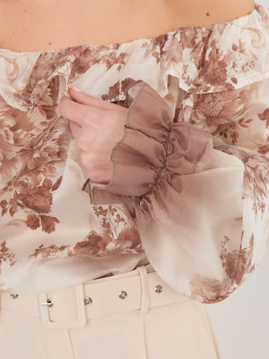 Blusa beige con stampa floreale e spalle scoperte