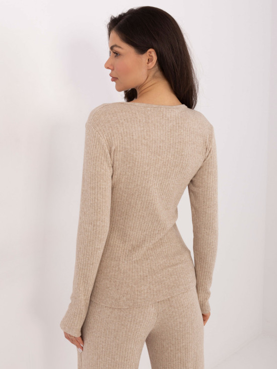 Maglione beige a costine con scollo a V
