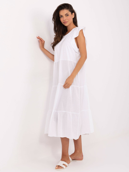 Abito bianco oversize con volant