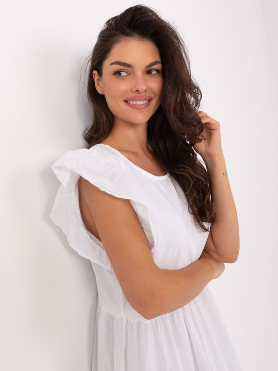 Abito bianco oversize con volant