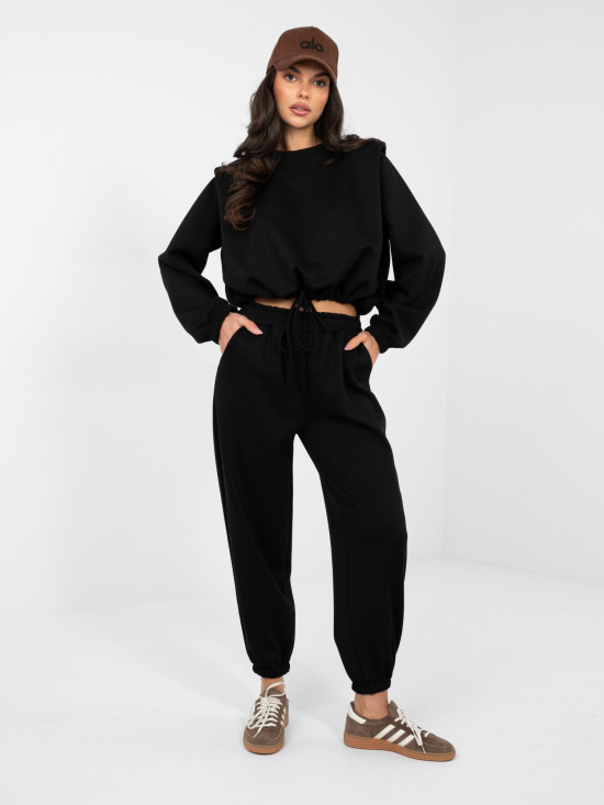 Completo nero da donna con laccetto e spalline imbottite