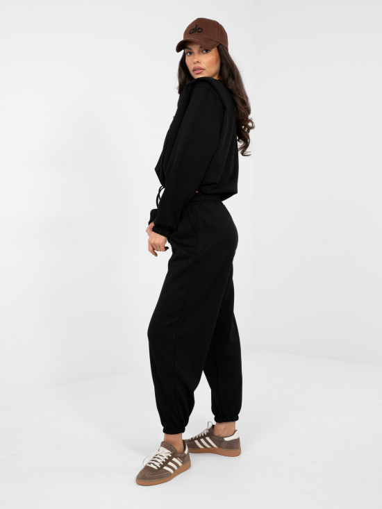 Completo nero da donna con laccetto e spalline imbottite