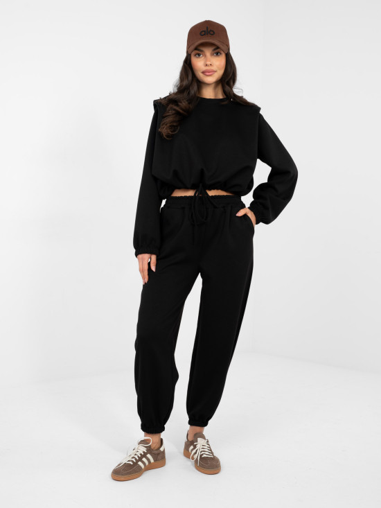 Completo nero da donna con laccetto e spalline imbottite