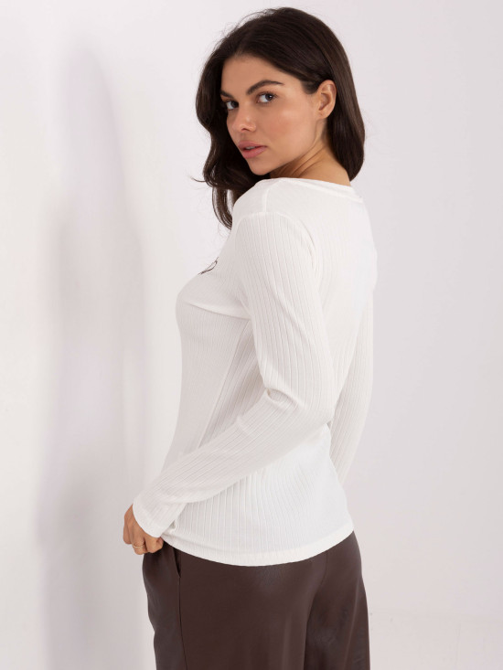 Blusa bianca ricamata con scollo a V
