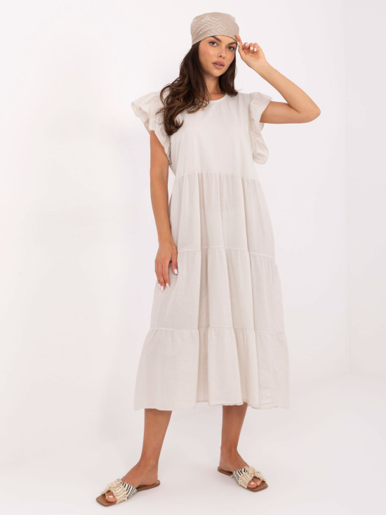 Abito oversize beige con volant