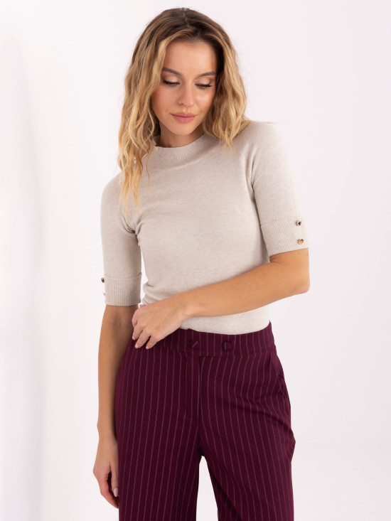 Elegante maglione beige con collo alto e maniche corte