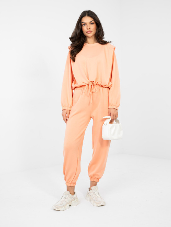 Completo arancione da donna con cintura e maniche lunghe