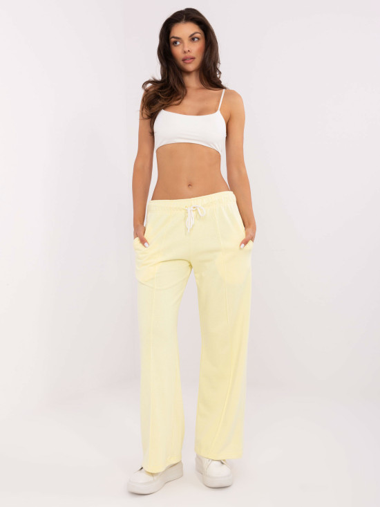Pantaloni sportivi eleganti in giallo brillante