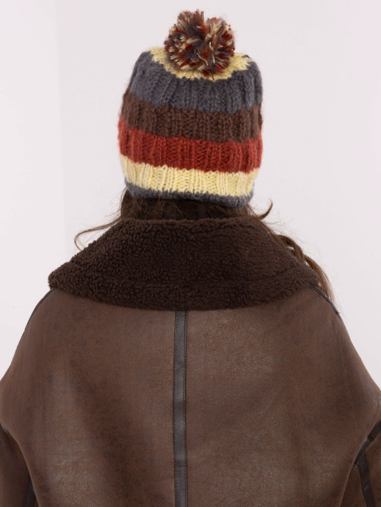 Cappello giallo a righe con pompon