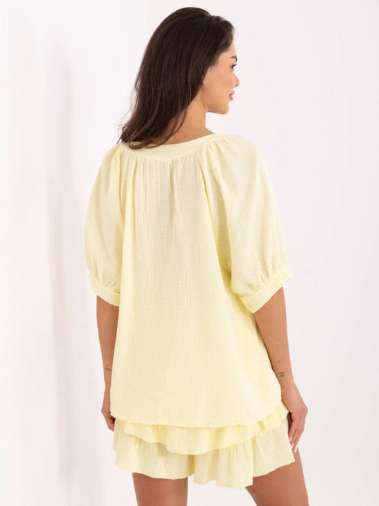 Completo elegante in giallo brillante