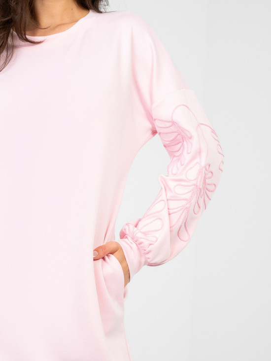 Mini abito rosa con ricamo e maniche a sbuffo