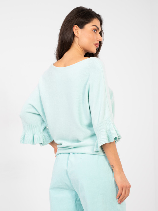 Elegante maglione azzurro con volant e maniche 3/4