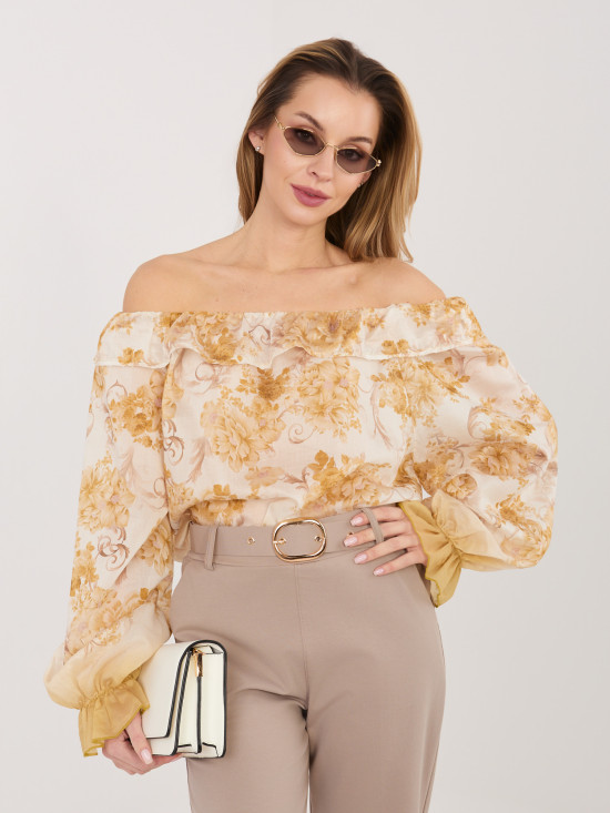 Blusa gialla con fantasia floreale e spalle scoperte