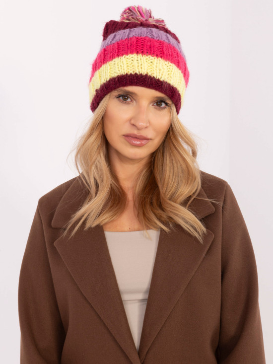 Cappello elegante con righe e pompon