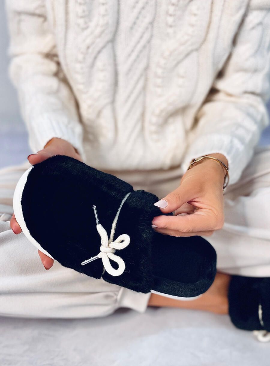 Pantofole in pelliccia nere