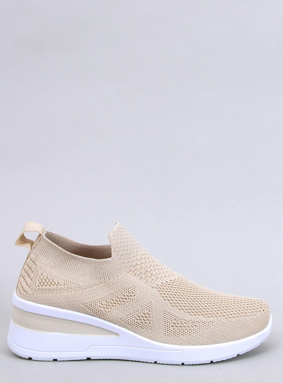 Sneakers beige elasticizzate su suola rialzata