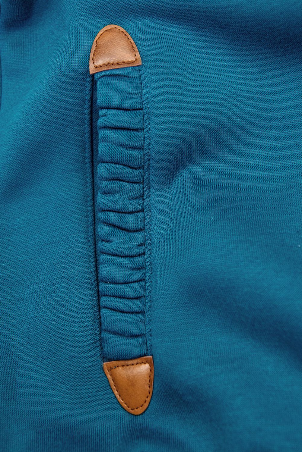 Felpa turchese con fodera colorata nel cappuccio