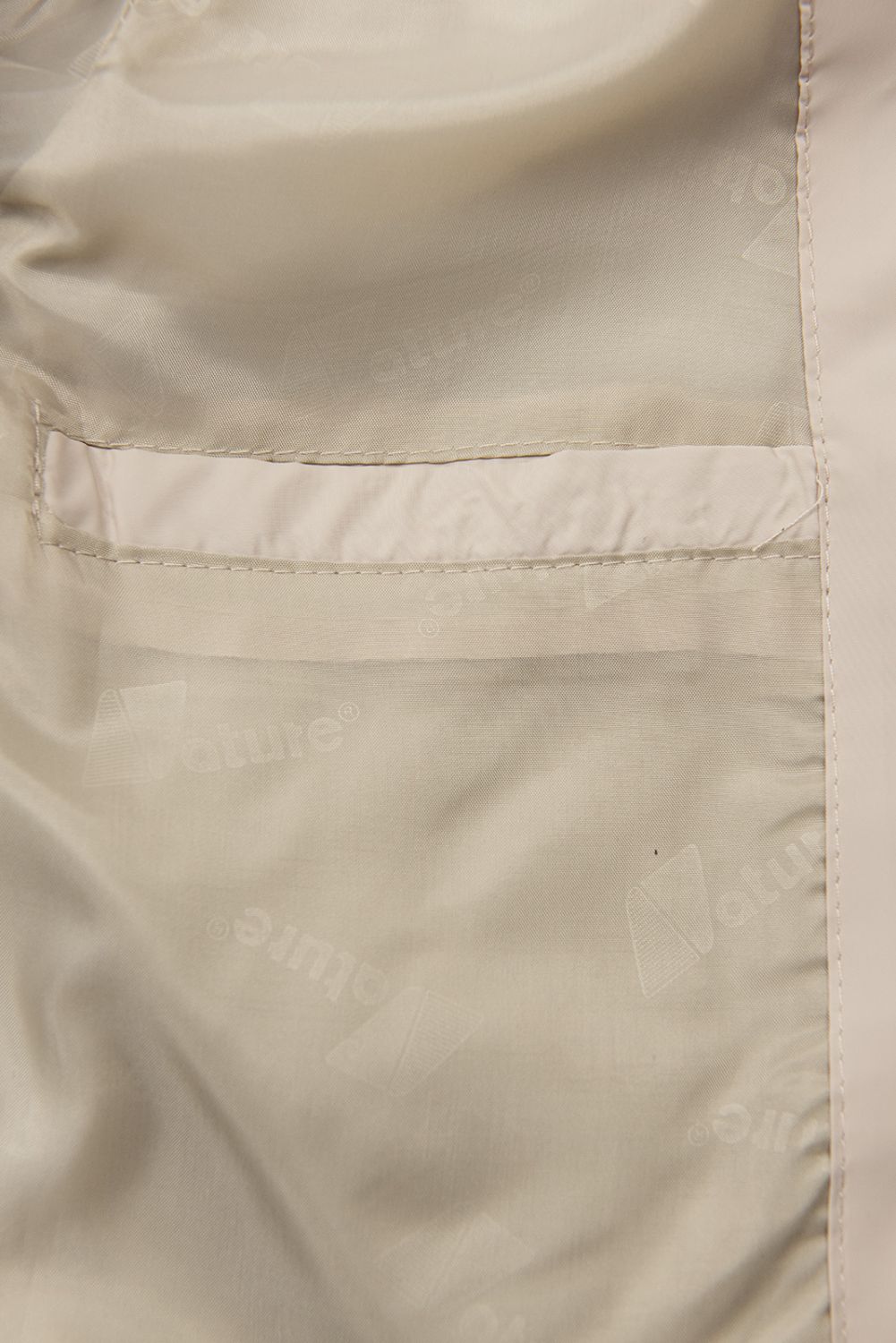 Giacca di transizione dal taglio allungato beige