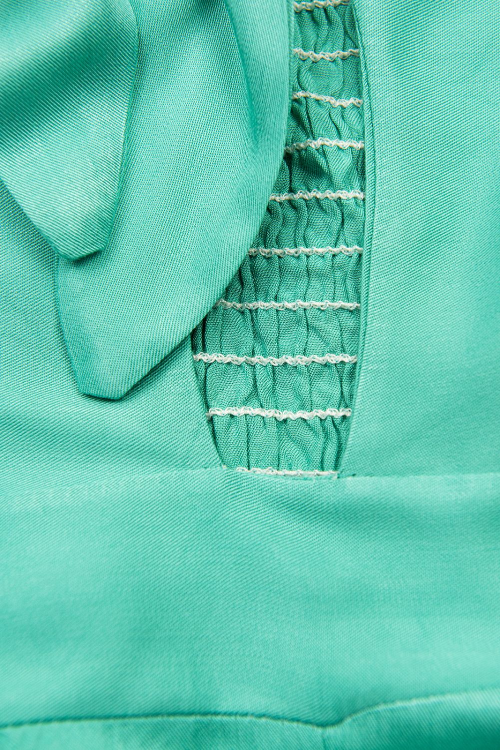 Tuta verde turchese
