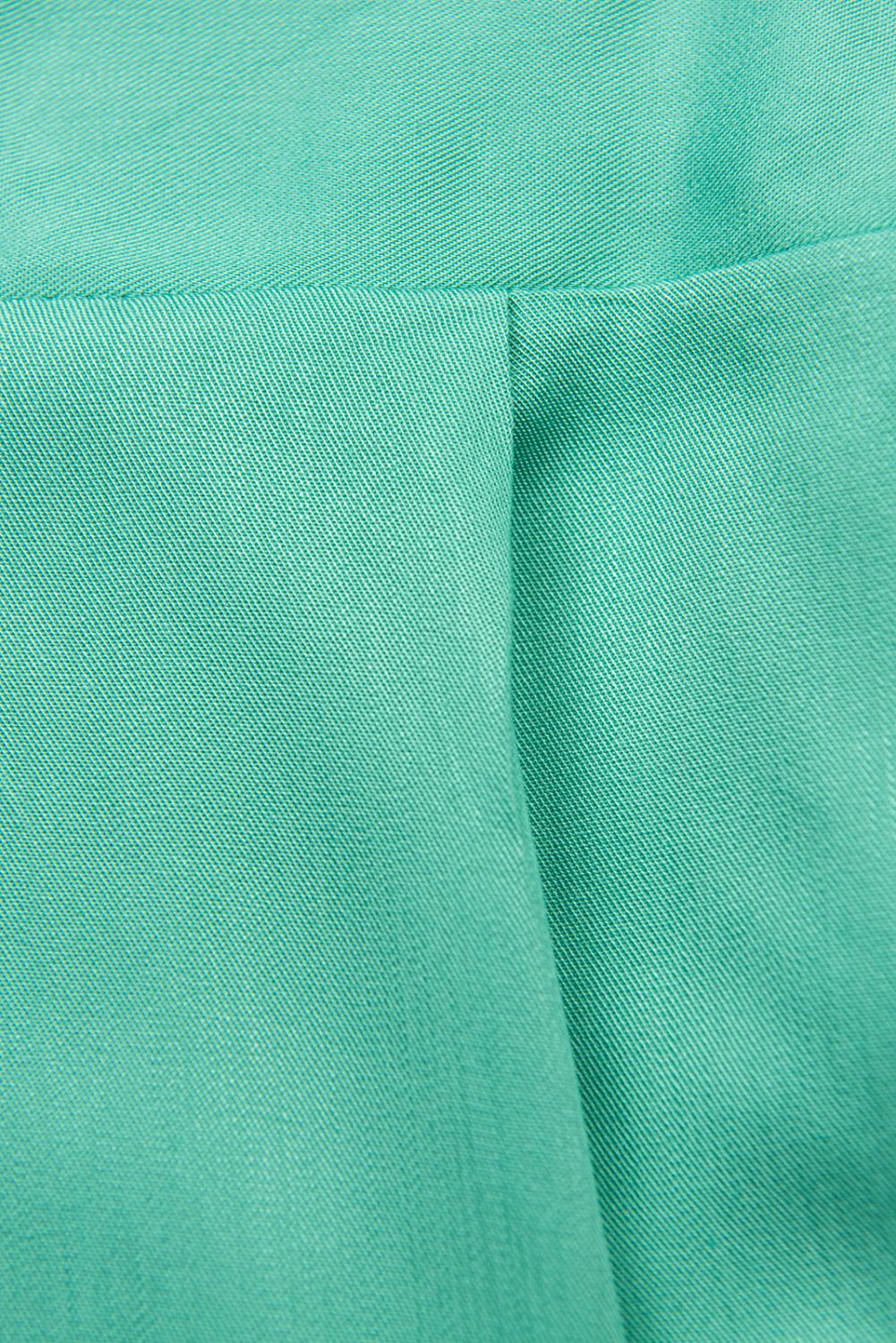 Tuta verde turchese