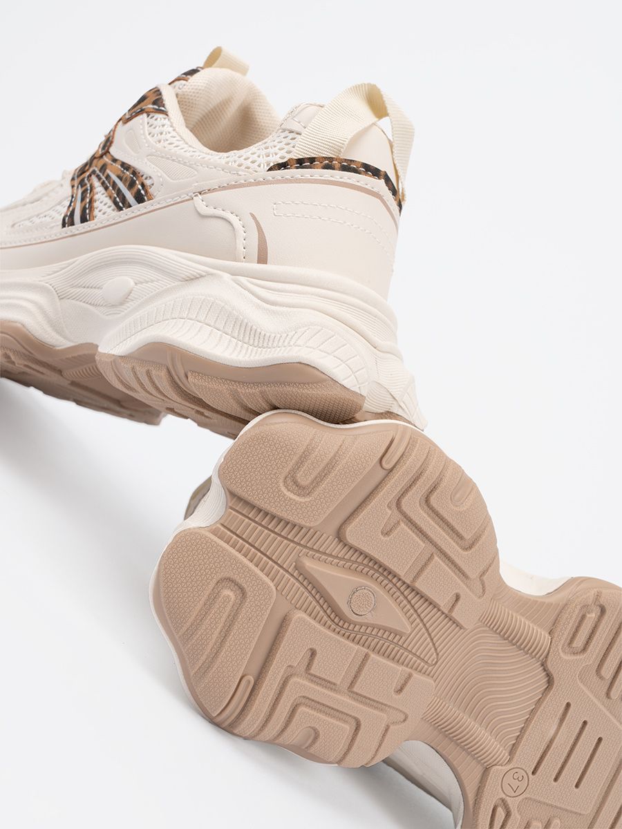 Sneakers con suola spessa in stampa leopardata