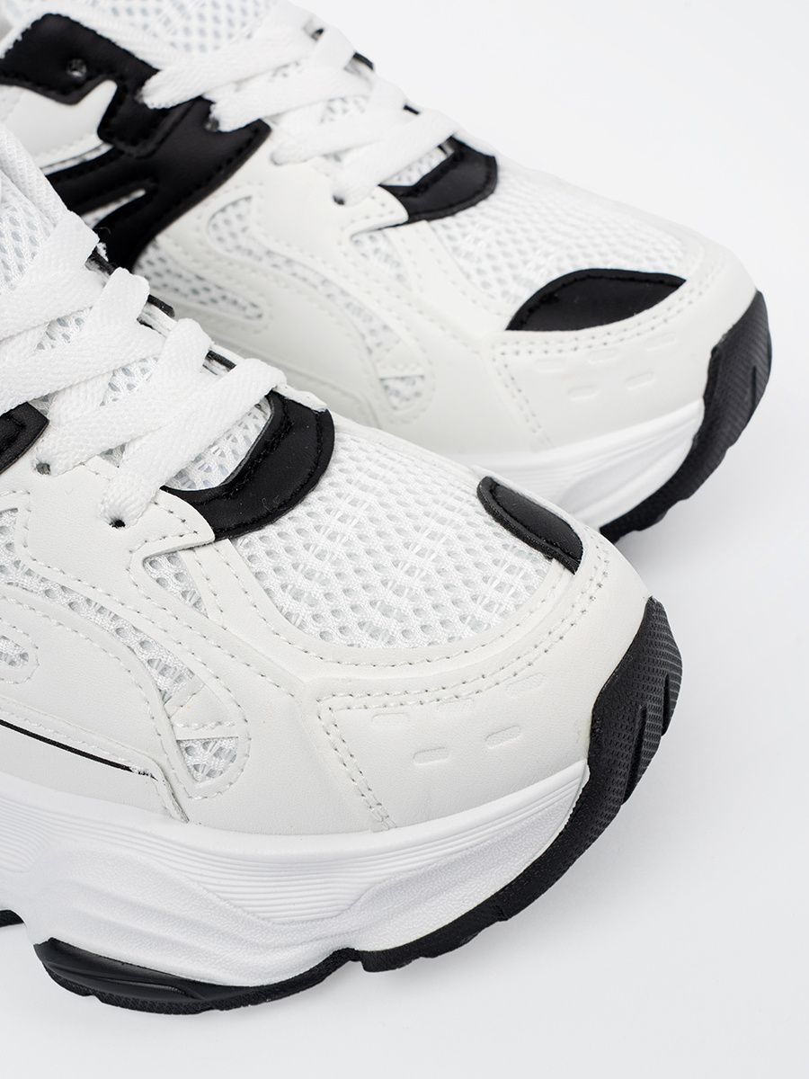Sneakers bianche con suola spessa