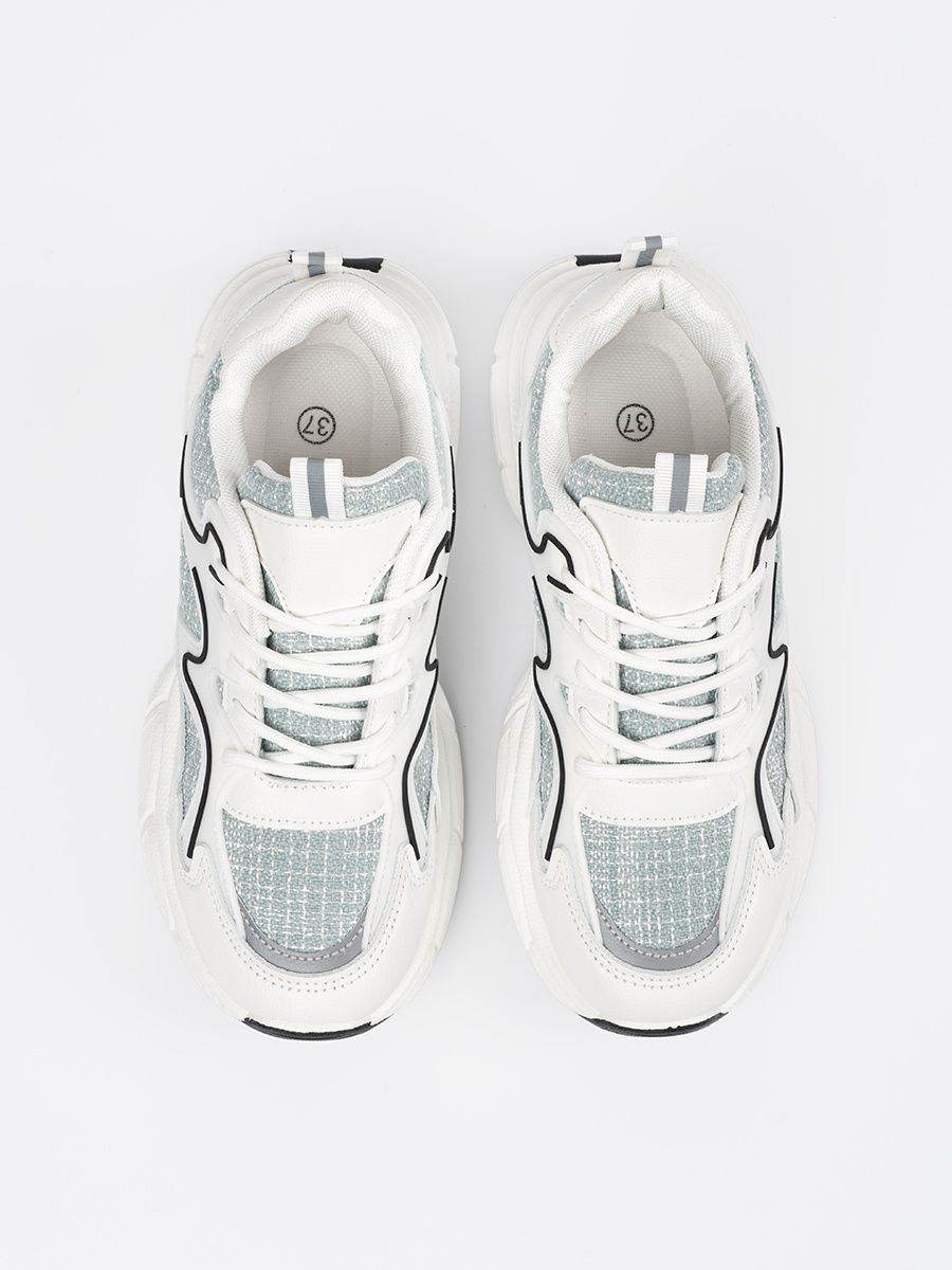 Sneakers bianche-verdi con inserti decorativi