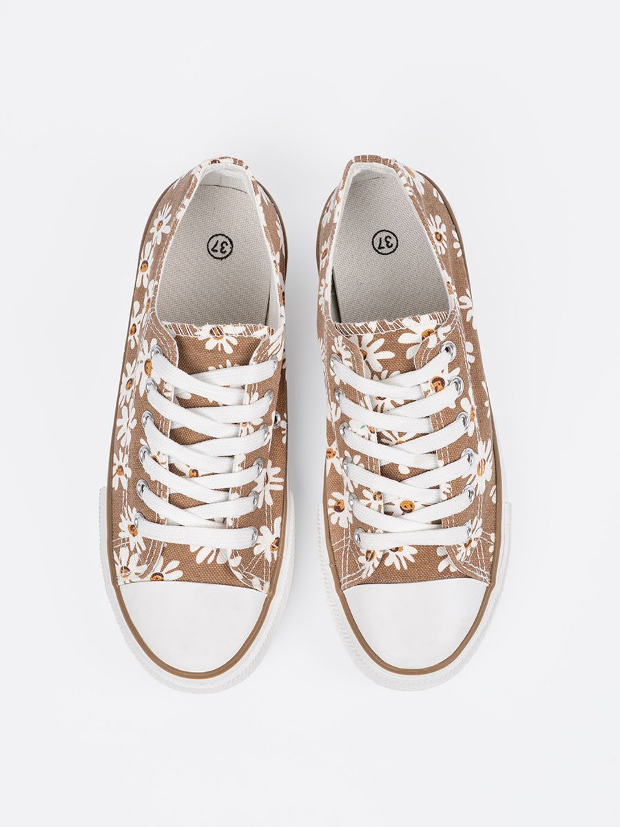 Sneakers beige con motivo floreale