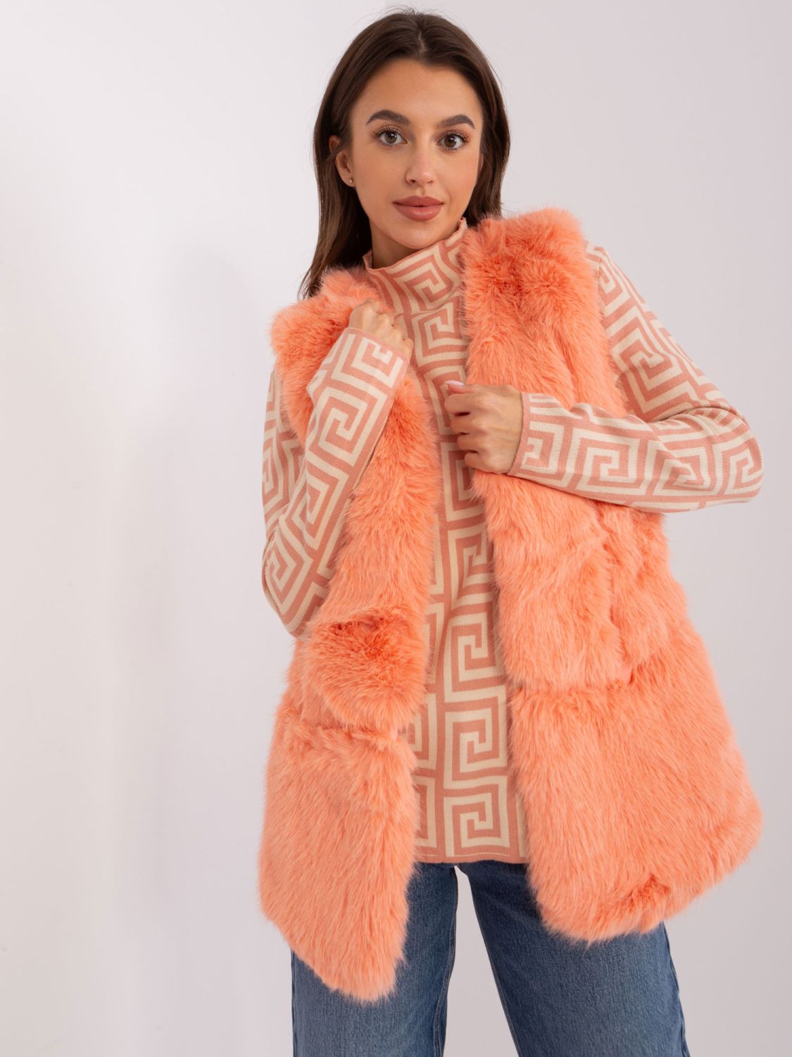 Gilet in pelliccia color pesca con fodera