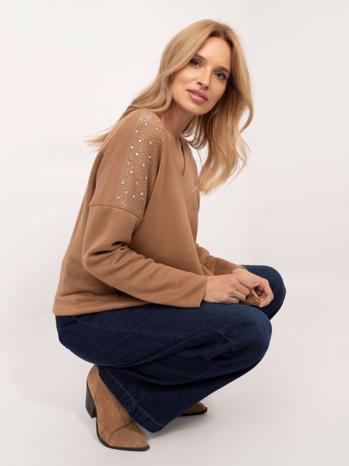 Maglione elegante con applicazione