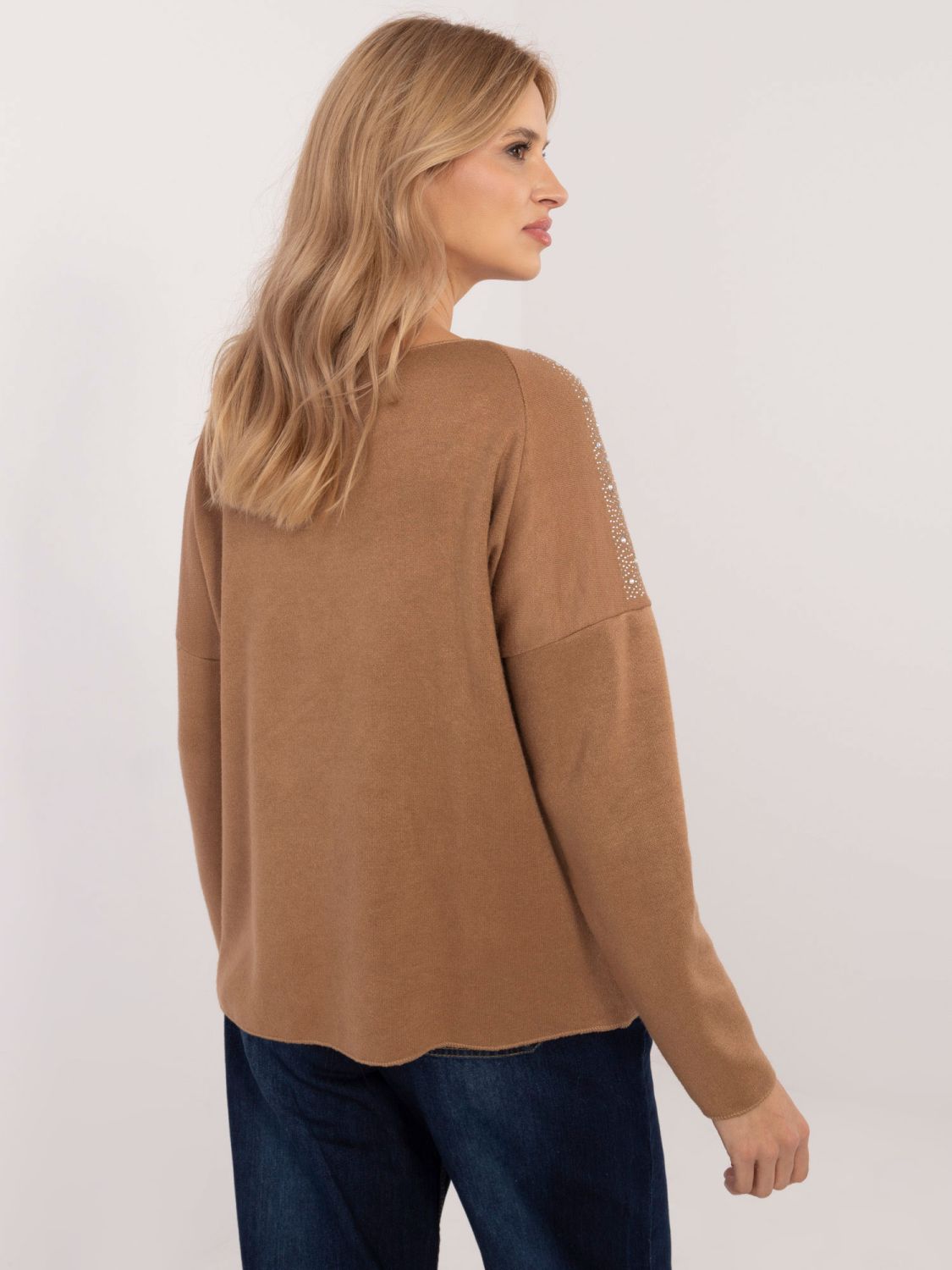 Maglione elegante con applicazione