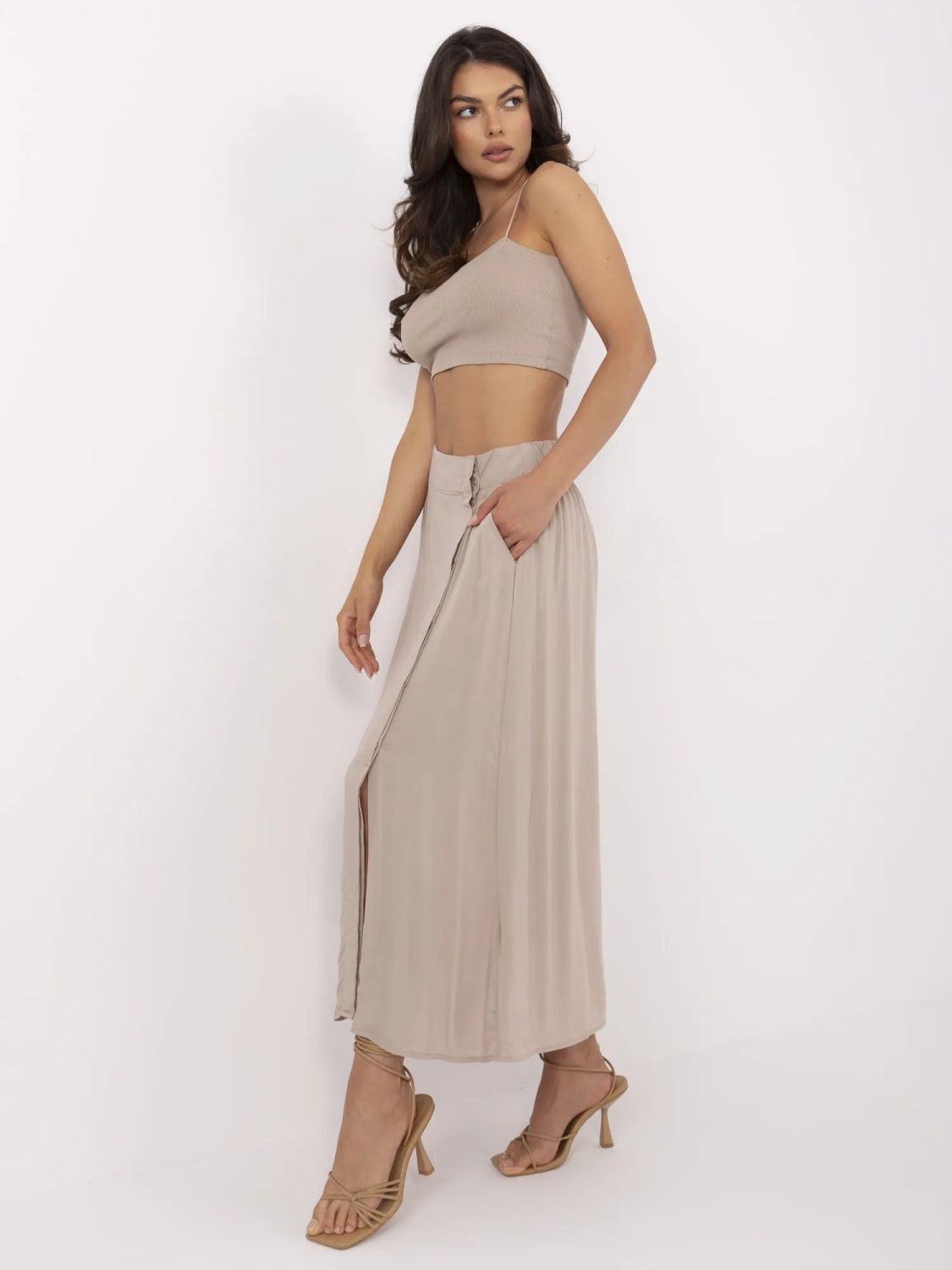 Elegantna midi suknja u bež boji